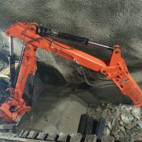 Stationary rockbreaker boom system