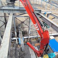 stationary fixed rock breaking boom system